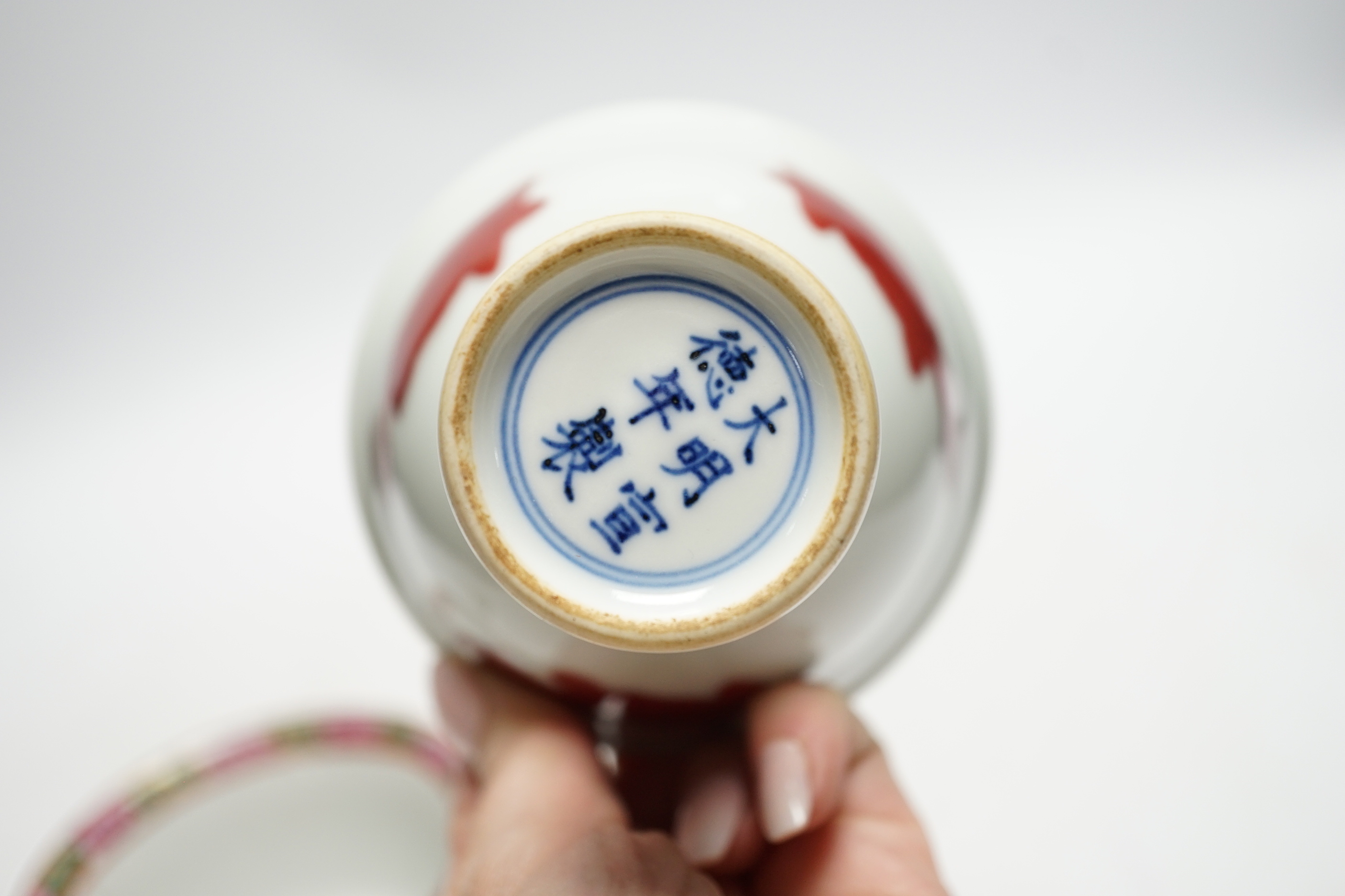 A Chinese tea bowl and stand, a white glazed horse and a pedestal bowl, tallest 9cm high